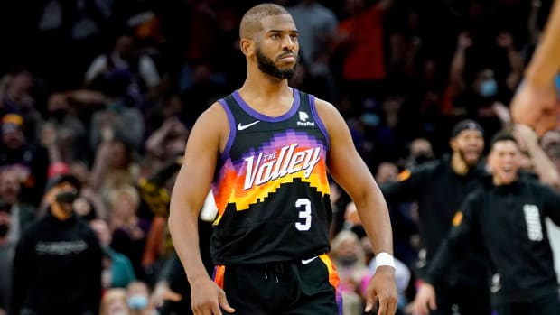 Phoenix Suns guard Chris Paul (3) stares towards the San Antonio Spurs bench after scoring during the second half of an NBA basketball game, Sunday, Jan. 30, 2022, in Phoenix. The Suns defeated the Spurs 115-110.